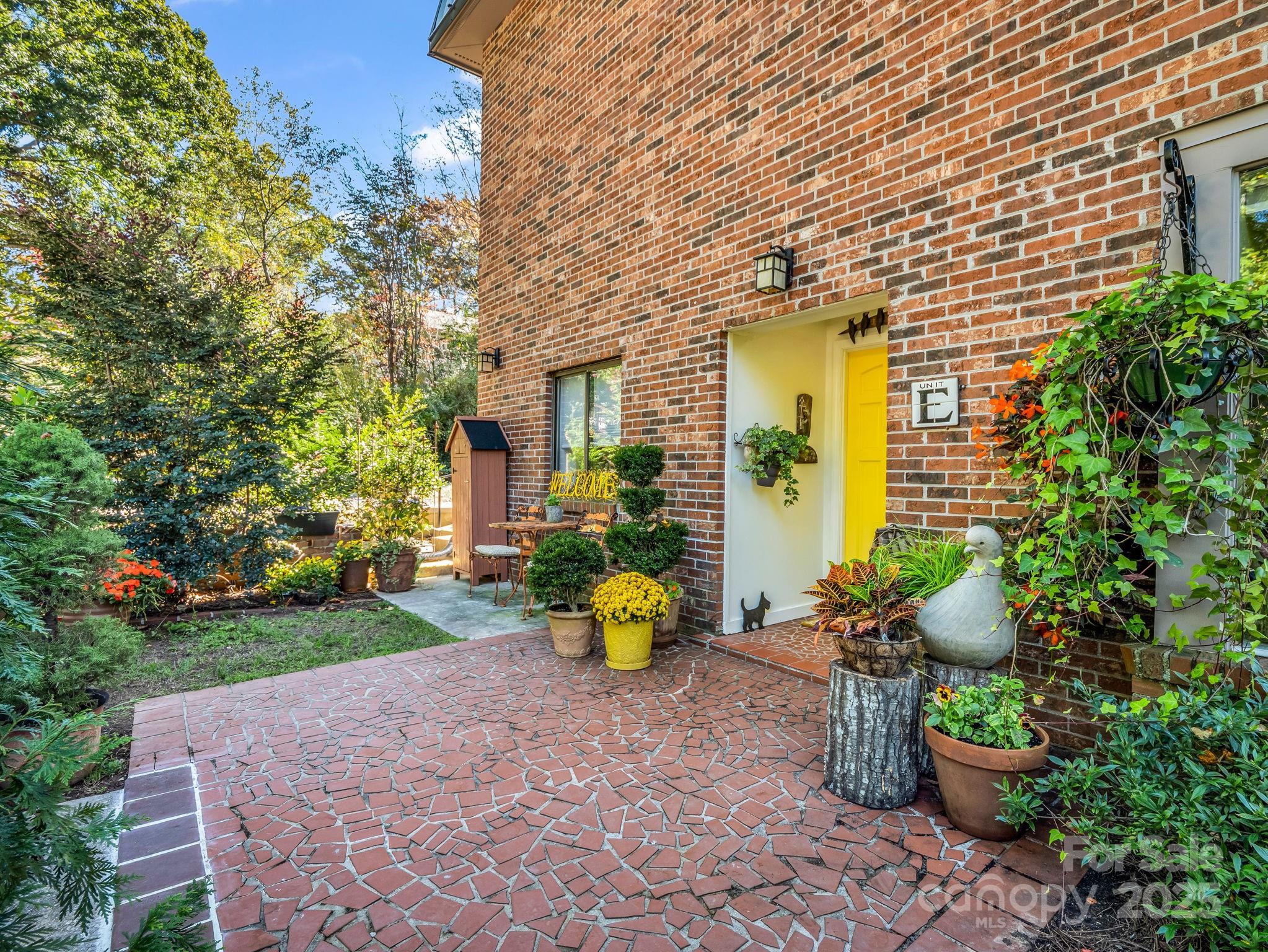 a view of a two chair in the backyard of the house