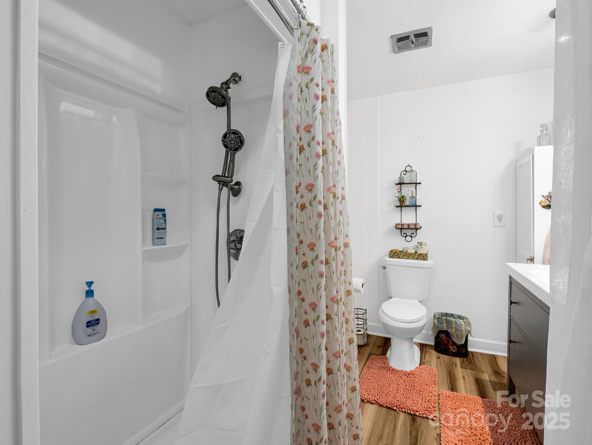 305 Grady Avenue Tryon, NC 28782 - Photo 22 of 24 a bathroom with a sink toilet and shower