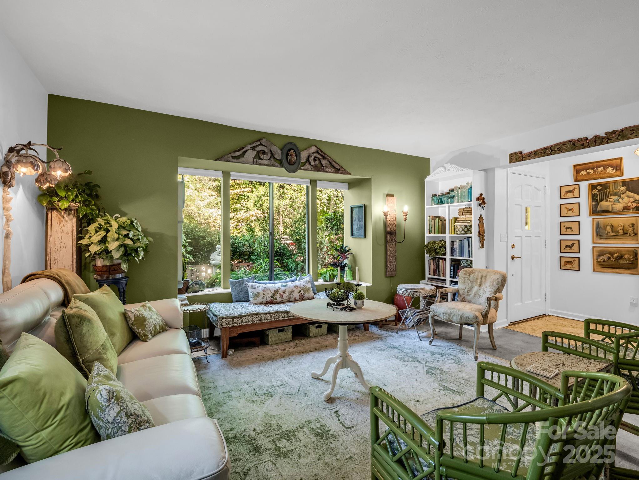 305 Grady Avenue Tryon, NC 28782 - Photo 7 of 24 a living room with furniture and a large window