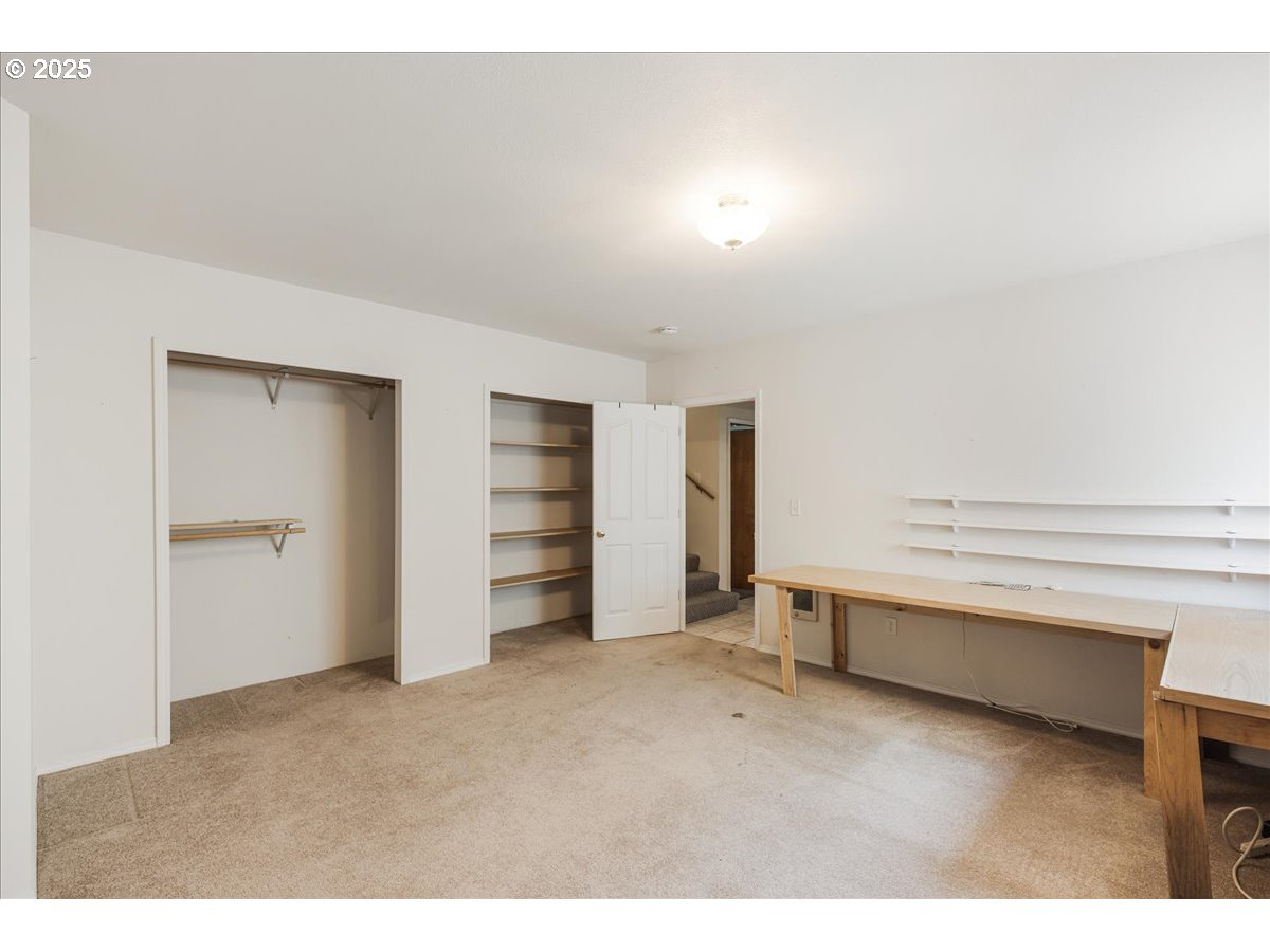 1825 Minnesota Street The Dalles, OR 97058 - Photo 21 of 47 a view of an empty room with closet and racks