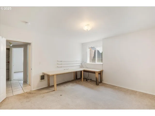 a room with furniture and window