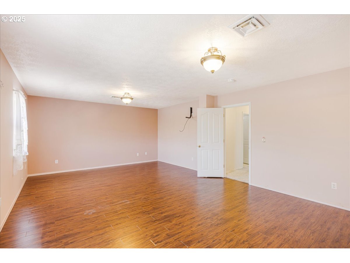 1825 Minnesota Street The Dalles, OR 97058 - Photo 27 of 47 a view of an empty room with a window