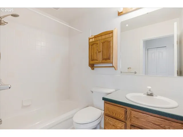 a kitchen with a stove and cabinets