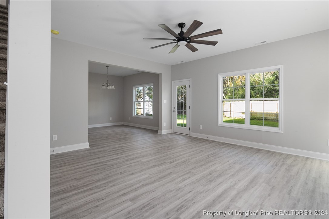 57 3rd Street Parkton, NC 28371 - Photo 5 of 24 a view of a livingroom with a window and wooden floor