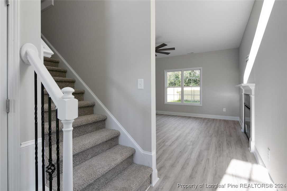 57 3rd Street Parkton, NC 28371 - Photo 10 of 24 a view of entryway and hall with wooden floor