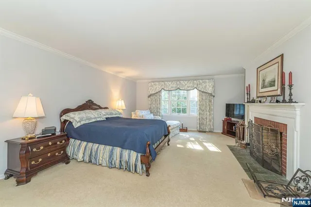 a white bath tub sitting next to a white sink