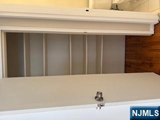 222 Garibaldi Avenue, Unit 47 Lodi, NJ 07644 - Photo 13 of 17 a view of walk in closet with empty racks