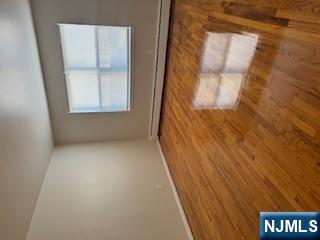 222 Garibaldi Avenue, Unit 47 Lodi, NJ 07644 - Photo 17 of 17 a view of an empty room with a window