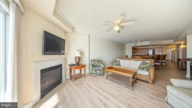 a kitchen with granite countertop a sink a stove and cabinets
