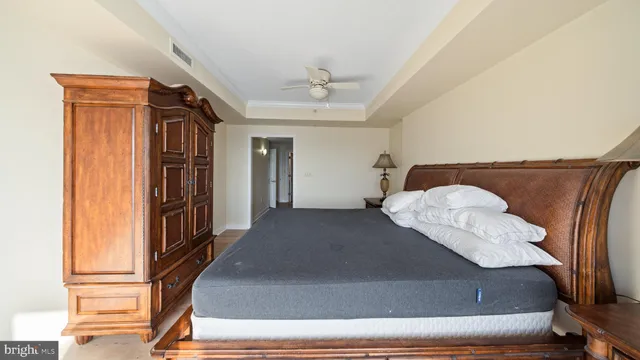 a bathroom with a tub a sink and mirror