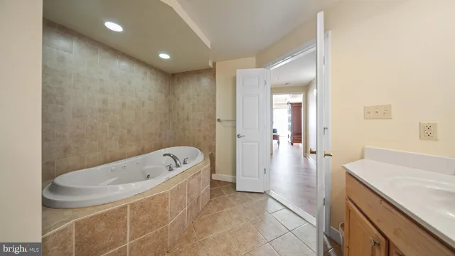 a bedroom with two beds and a window