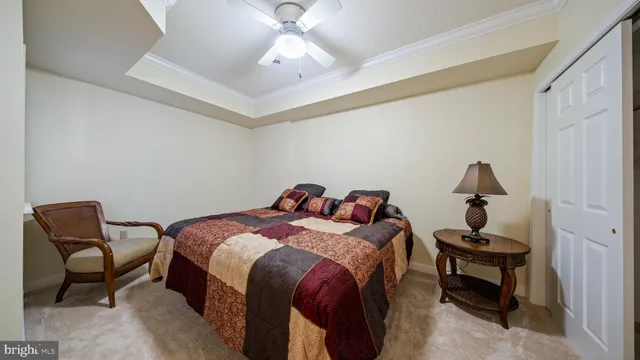 a bathroom with a toilet a sink and a mirror