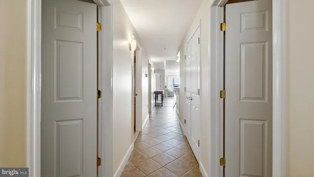 a bathroom with a shower and a cabinet