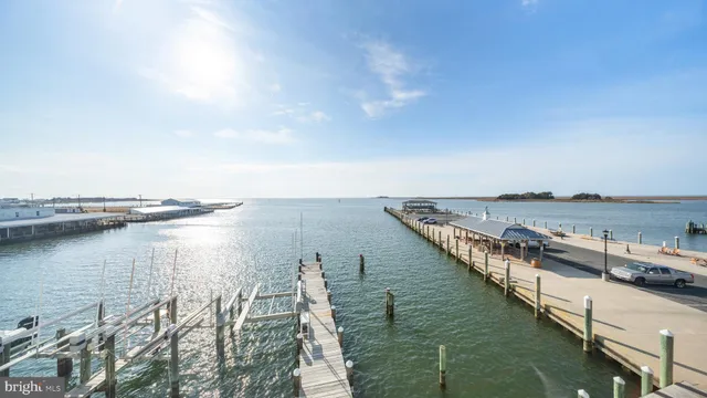 a view of a balcony with wooden floor