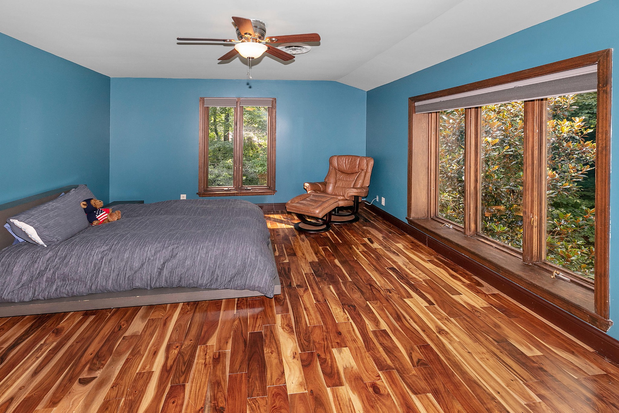 105 Balsam Road Oak Ridge, TN 37830 - Photo 21 of 40 a bedroom with a bed and wooden floor