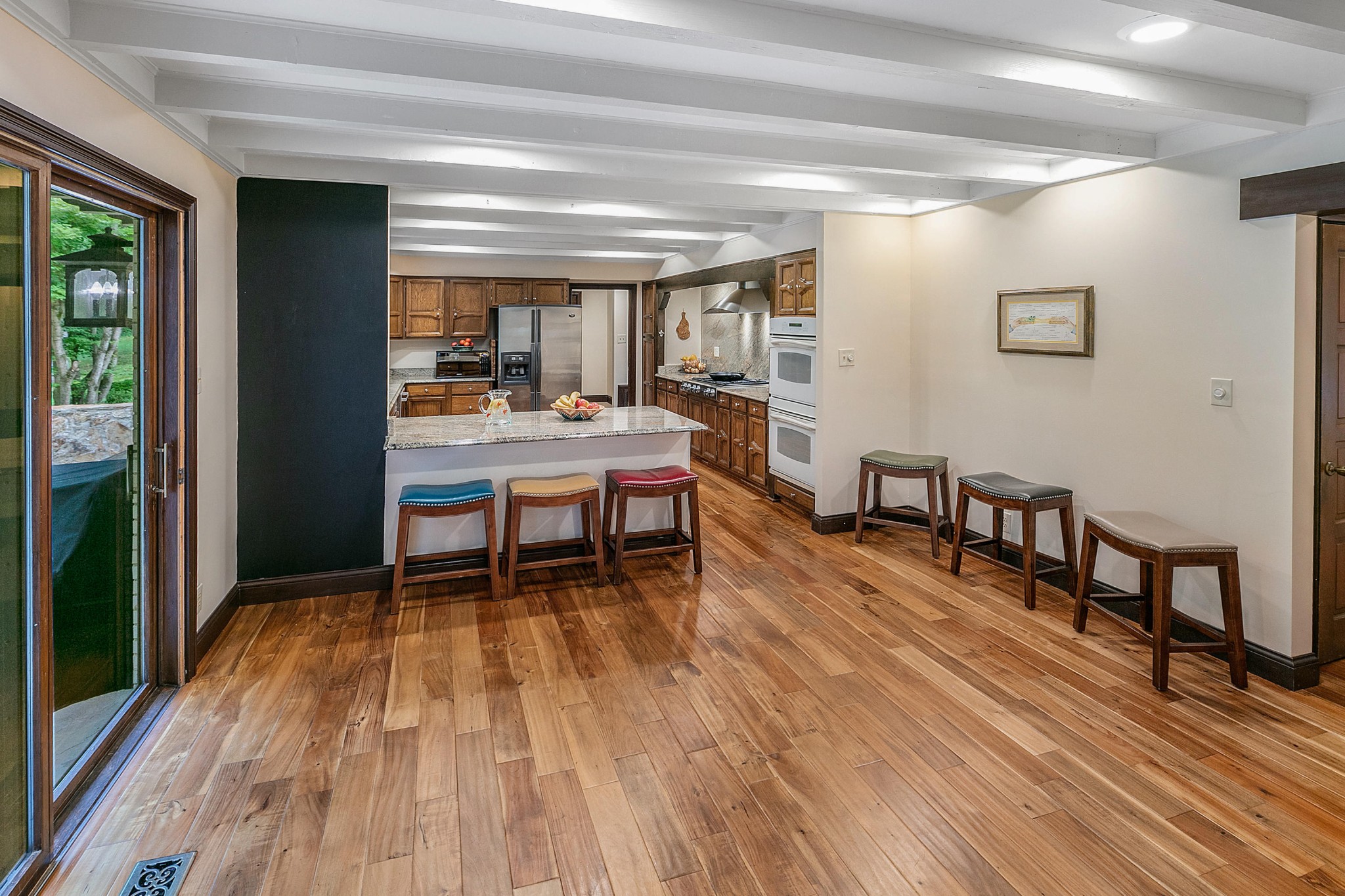 105 Balsam Road Oak Ridge, TN 37830 - Photo 7 of 40 a room with wooden floor and furniture