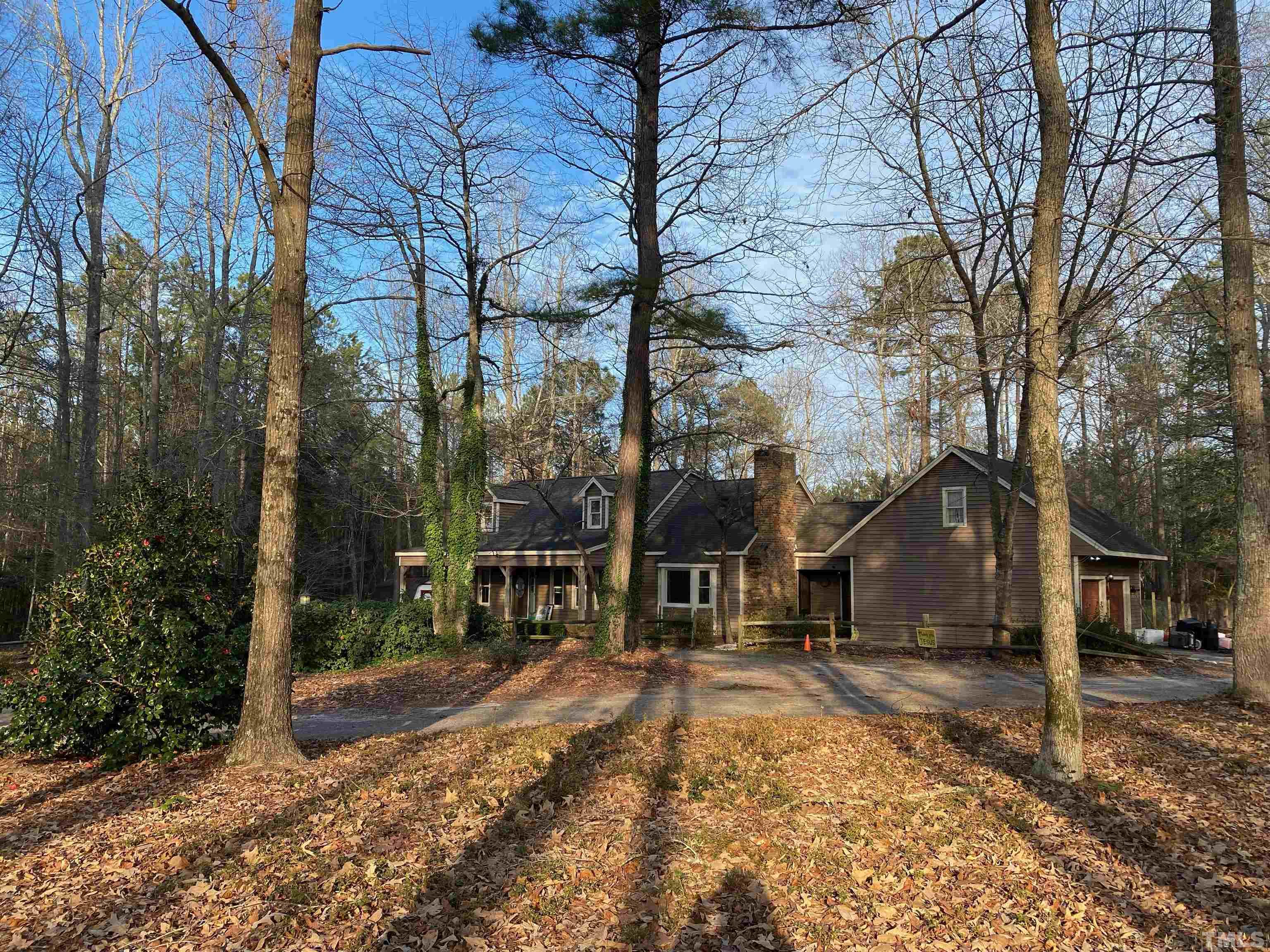 520 Old Stage Road Angier, NC 27501 - Photo 3 of 45 a view of house with trees in the background