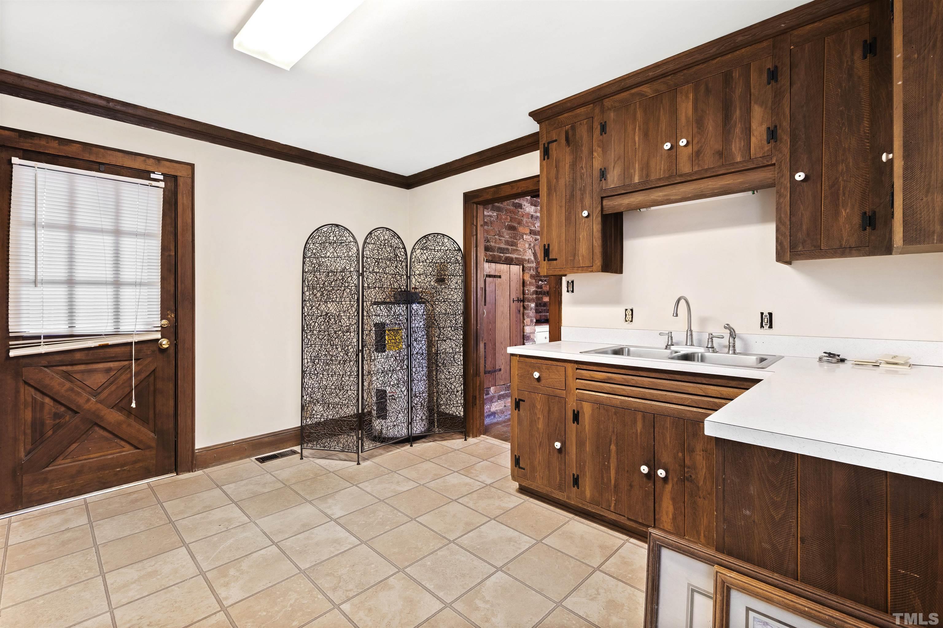 520 Old Stage Road Angier, NC 27501 - Photo 8 of 45 a kitchen with a sink stove and cabinets