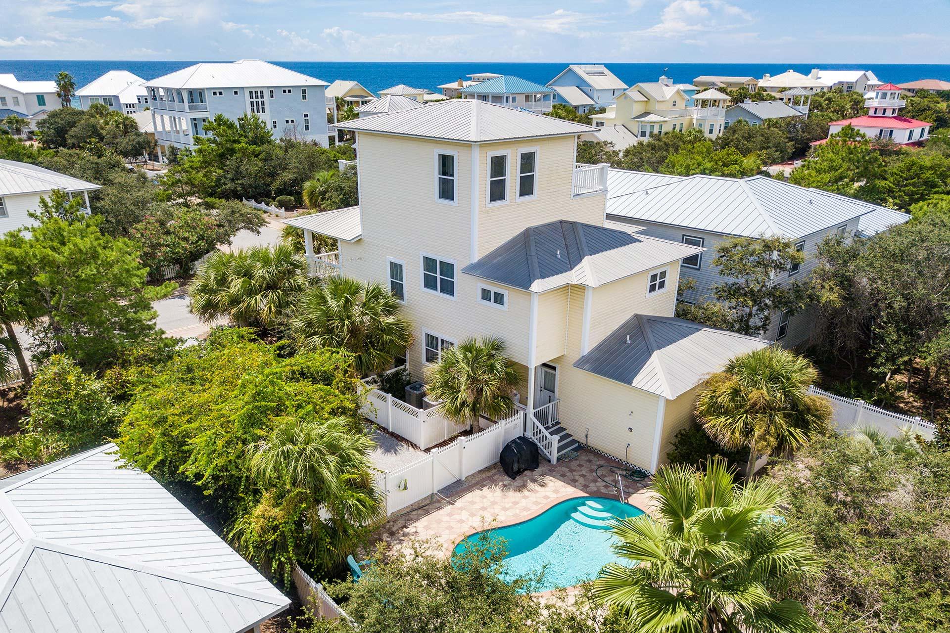 91 Old Beach Road Santa Rosa Beach, FL 32459 - Photo 1 of 25 an aerial view of a house with a yard