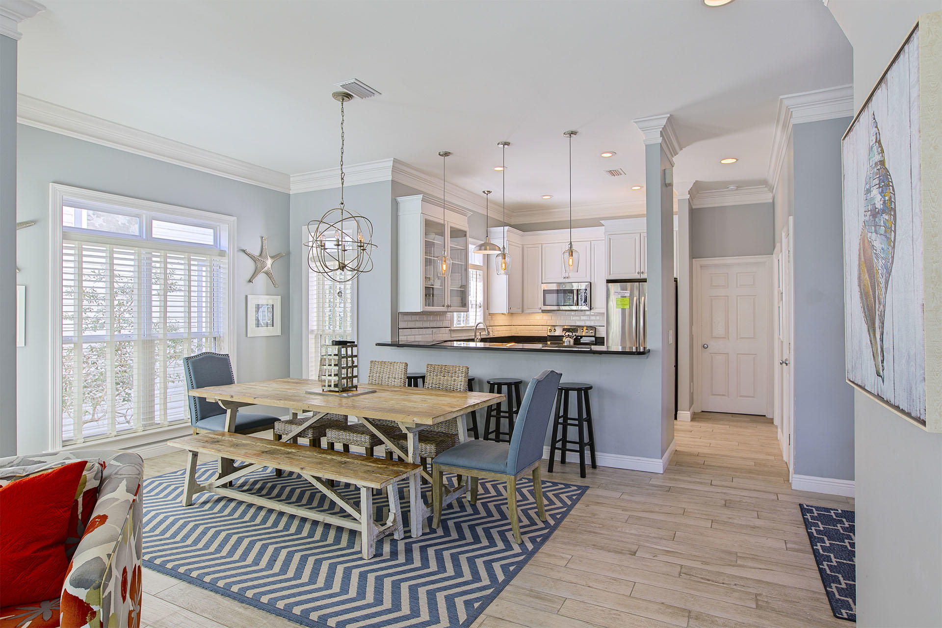 91 Old Beach Road Santa Rosa Beach, FL 32459 - Photo 14 of 25 a view of a dining room with furniture window and wooden floor