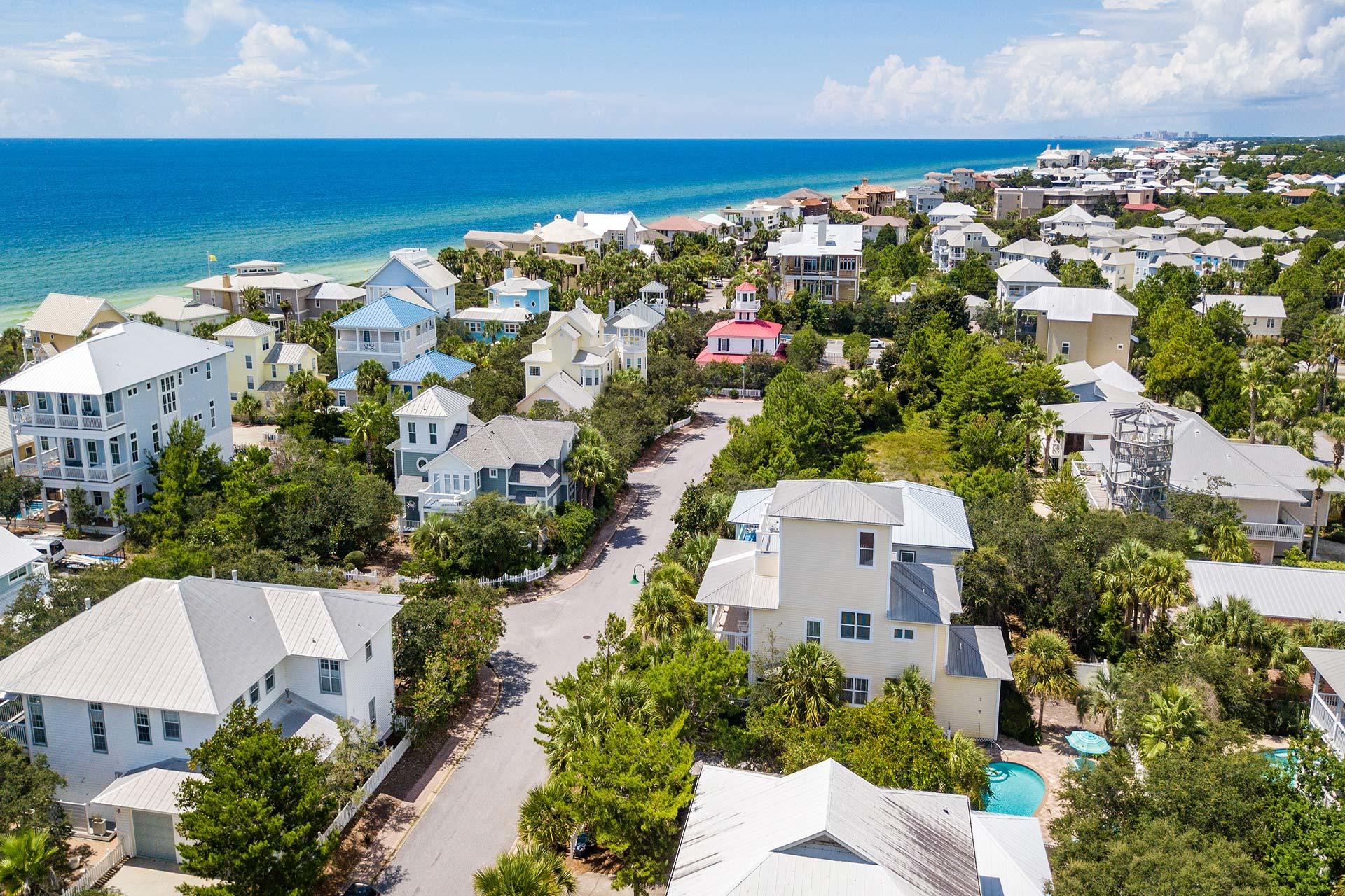 91 Old Beach Road Santa Rosa Beach, FL 32459 - Photo 5 of 25 an aerial view of a building with an outdoor space and seating
