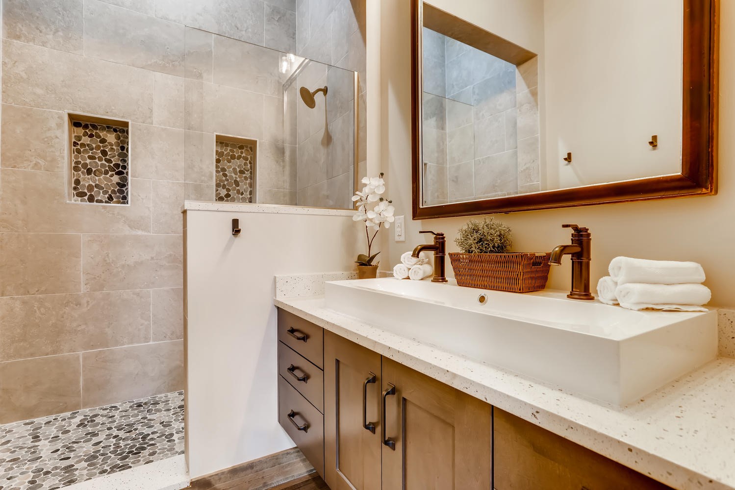 125 Lake Ridge Circle, Unit 1866 Keystone, CO 80435 - Photo 27 of 42 a bathroom with a sink and a mirror