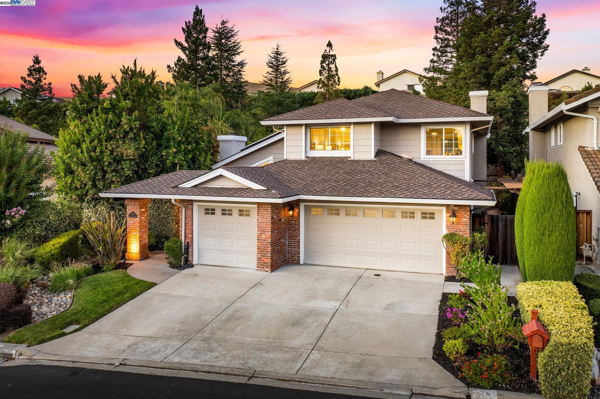 639 Canyon Crest Road East San Ramon, CA 94582 - Photo 1 of 1 a view of a white house with a yard plants and large tree