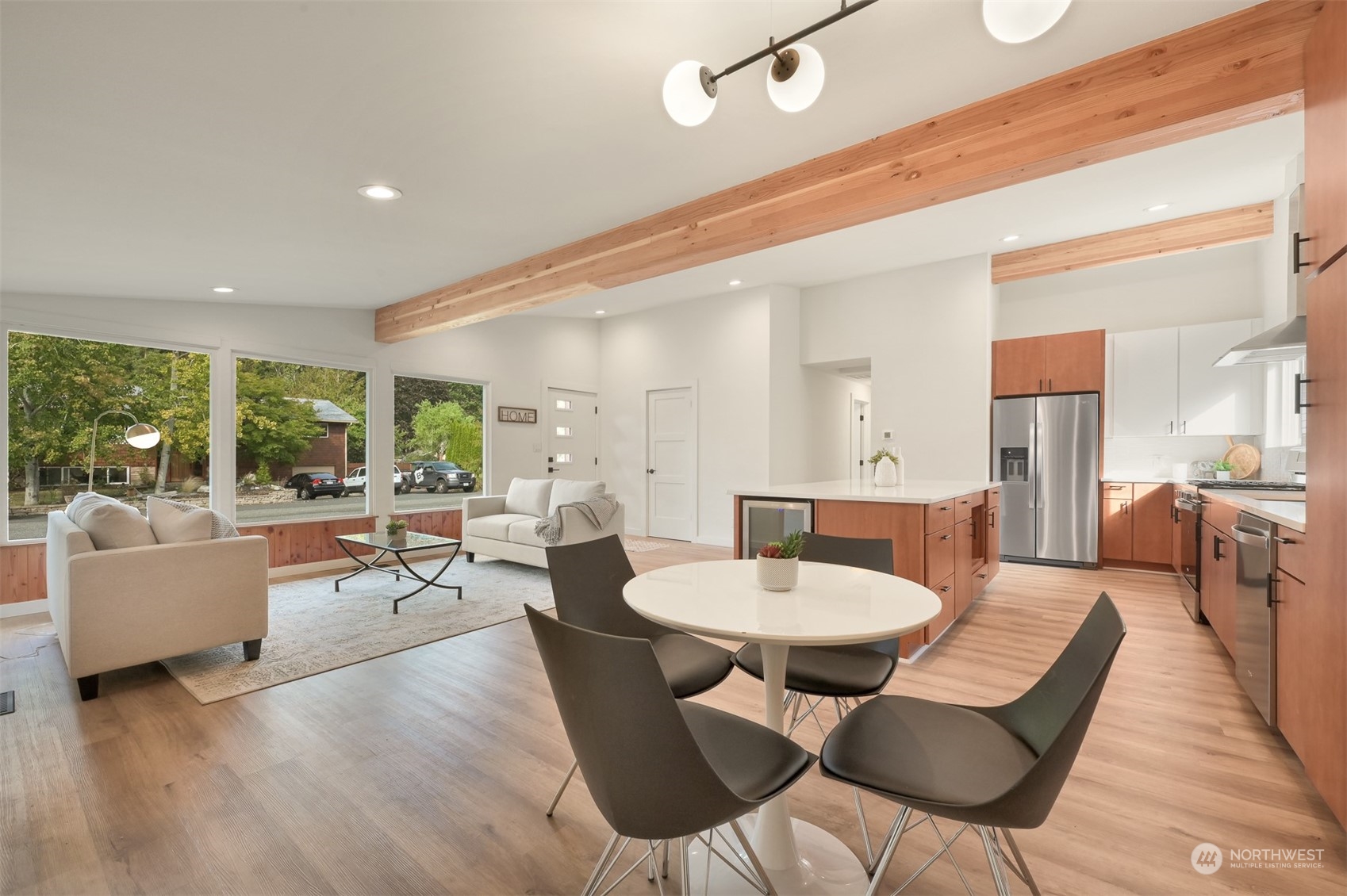 514 Fern Road Bellingham, WA 98225 - Photo 3 of 37 a view of a dining room with furniture and wooden floor