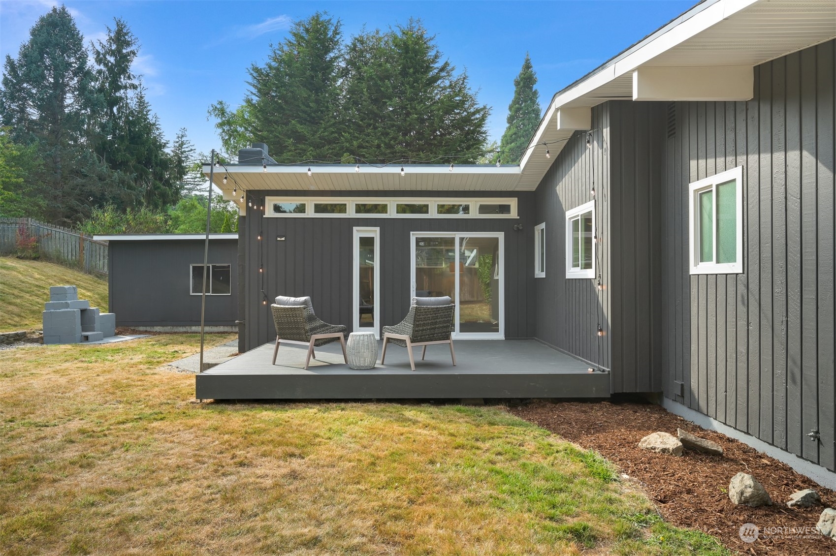514 Fern Road Bellingham, WA 98225 - Photo 34 of 37 a view of house with backyard porch and furniture
