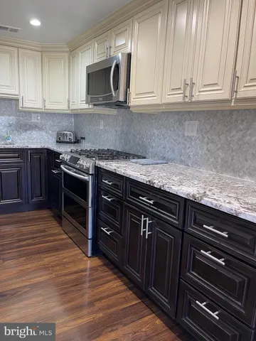 a view of a hallway view with staircase