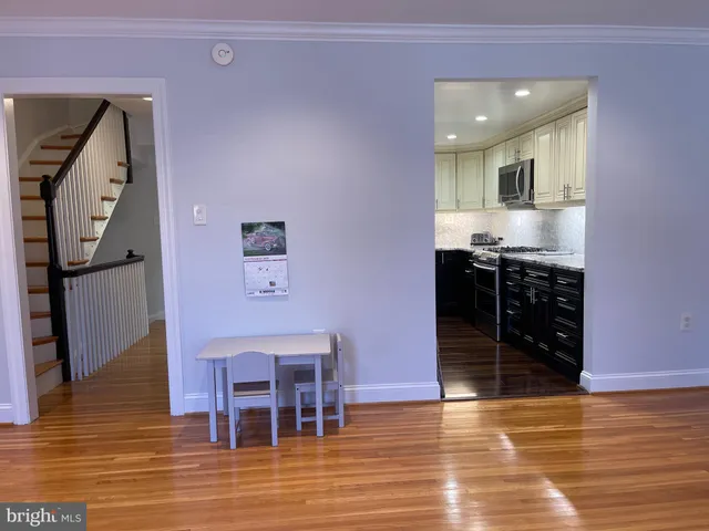 a view of a balcony with wooden floor