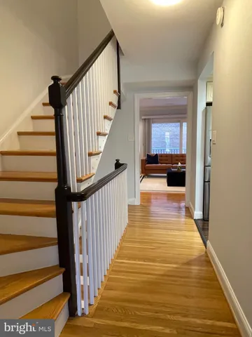 a view of a wooden deck and trees