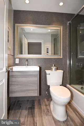 a en suite bathroom with a sink double vanity