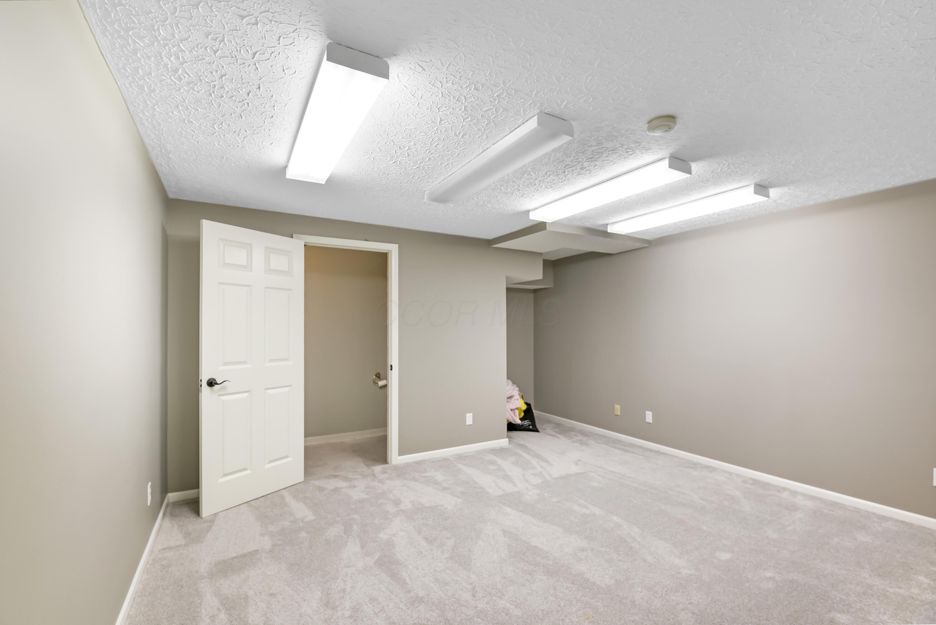 7792 Rodebaugh Road Reynoldsburg, OH 43068 - Photo 33 of 53 Finished Basement & Half Bath