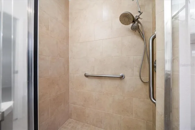 an aerial view of a house with pool patio and outdoor seating