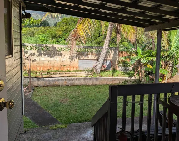 a view of swimming pool from a porch