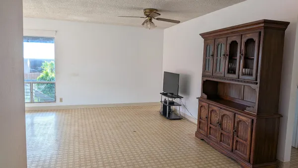 a view of a livingroom with furniture