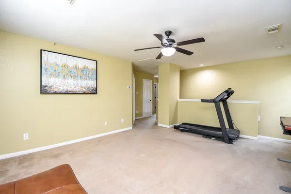 a view of a room with gym equipment