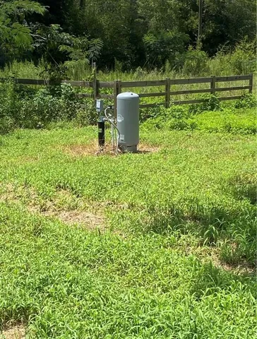 a view of a garden with a bench