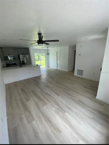 a view of a car garage with a sink