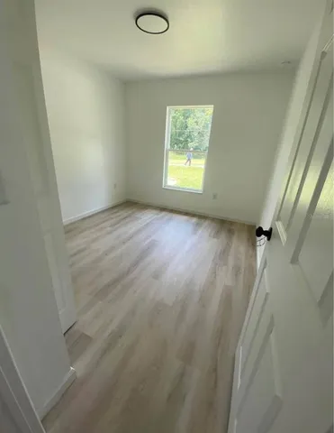 an empty room with windows