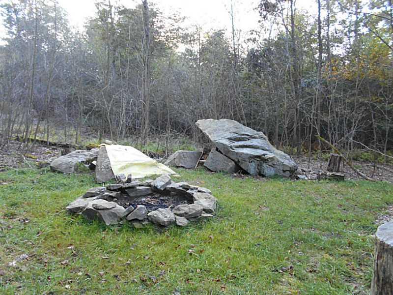 199 Anglers Club Road Confluence, PA 15424 - Photo 3 of 8 Exterior Front. fire pit