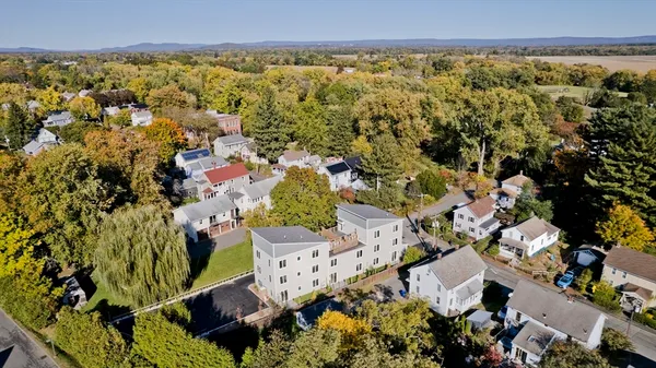 an aerial view of multiple house