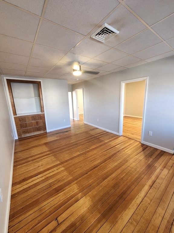 920 Pine Street, Unit 3W Fall River, MA 02720 - Photo 4 of 9 a view of empty room with wooden floor