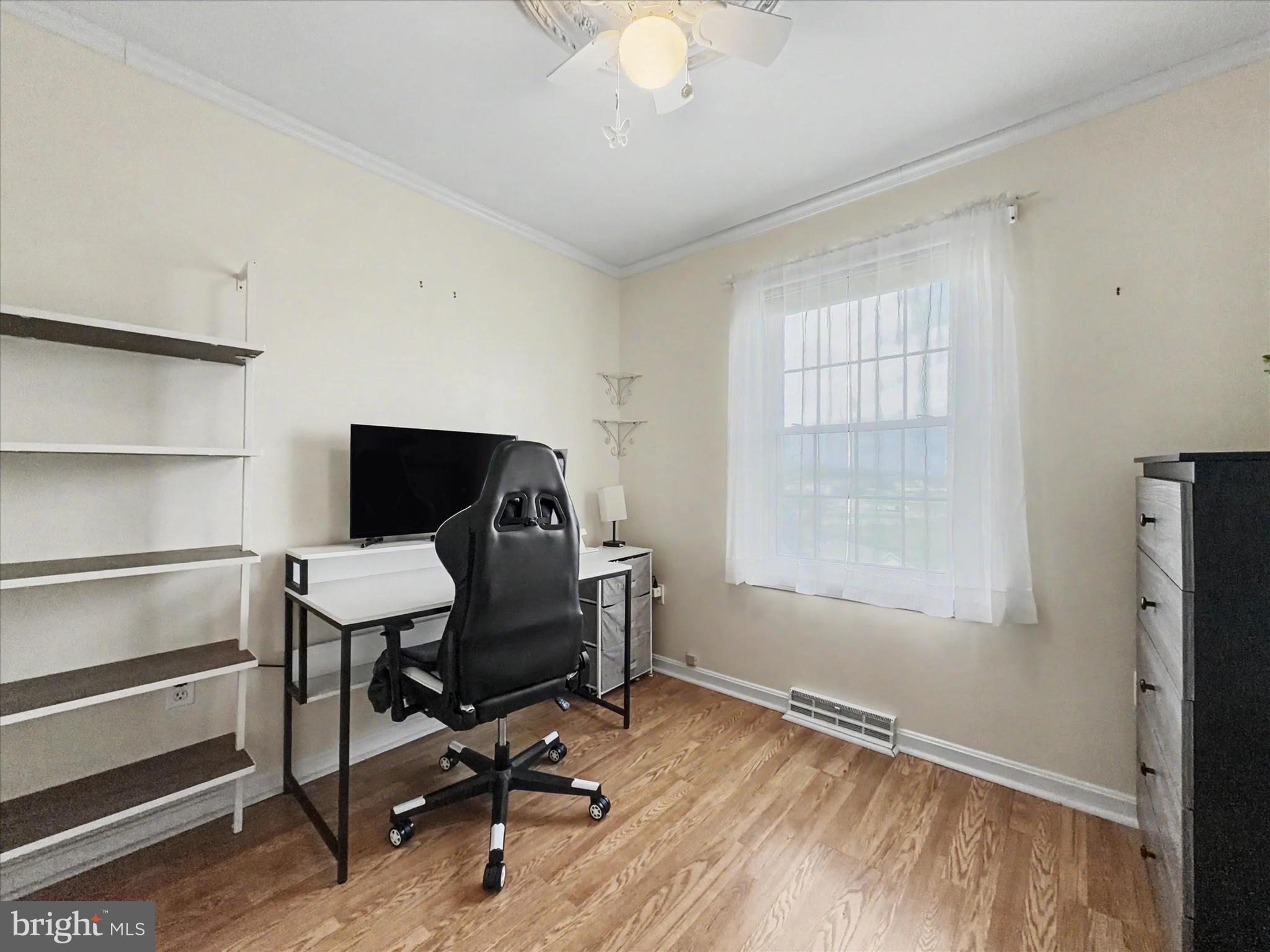 2941 Robin Road York, PA 17404 - Photo 15 of 23 a view of a workspace with furniture and a window