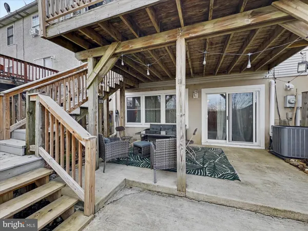 a view of porch with wooden floor and seating space