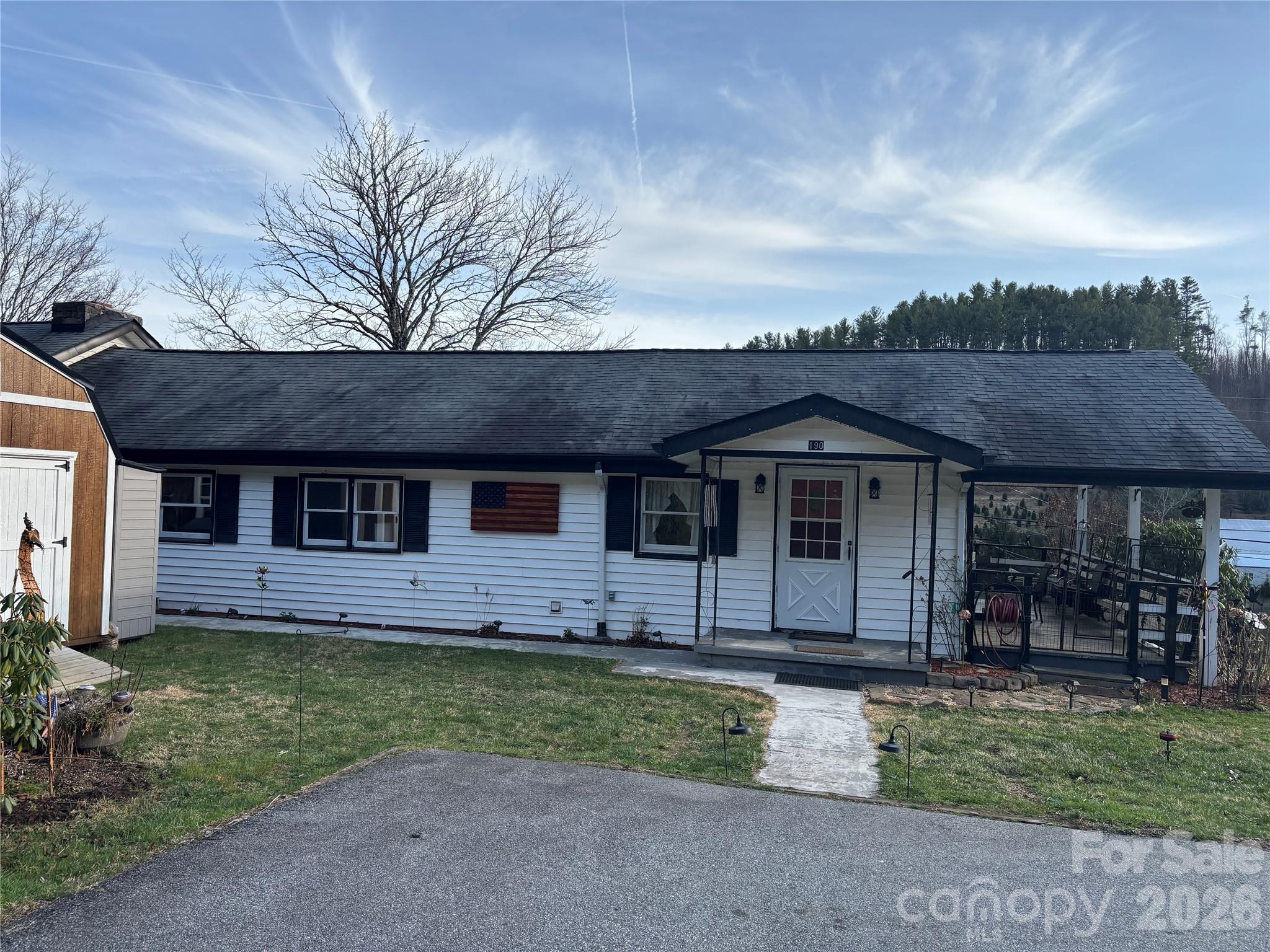 front view of a house with a yard