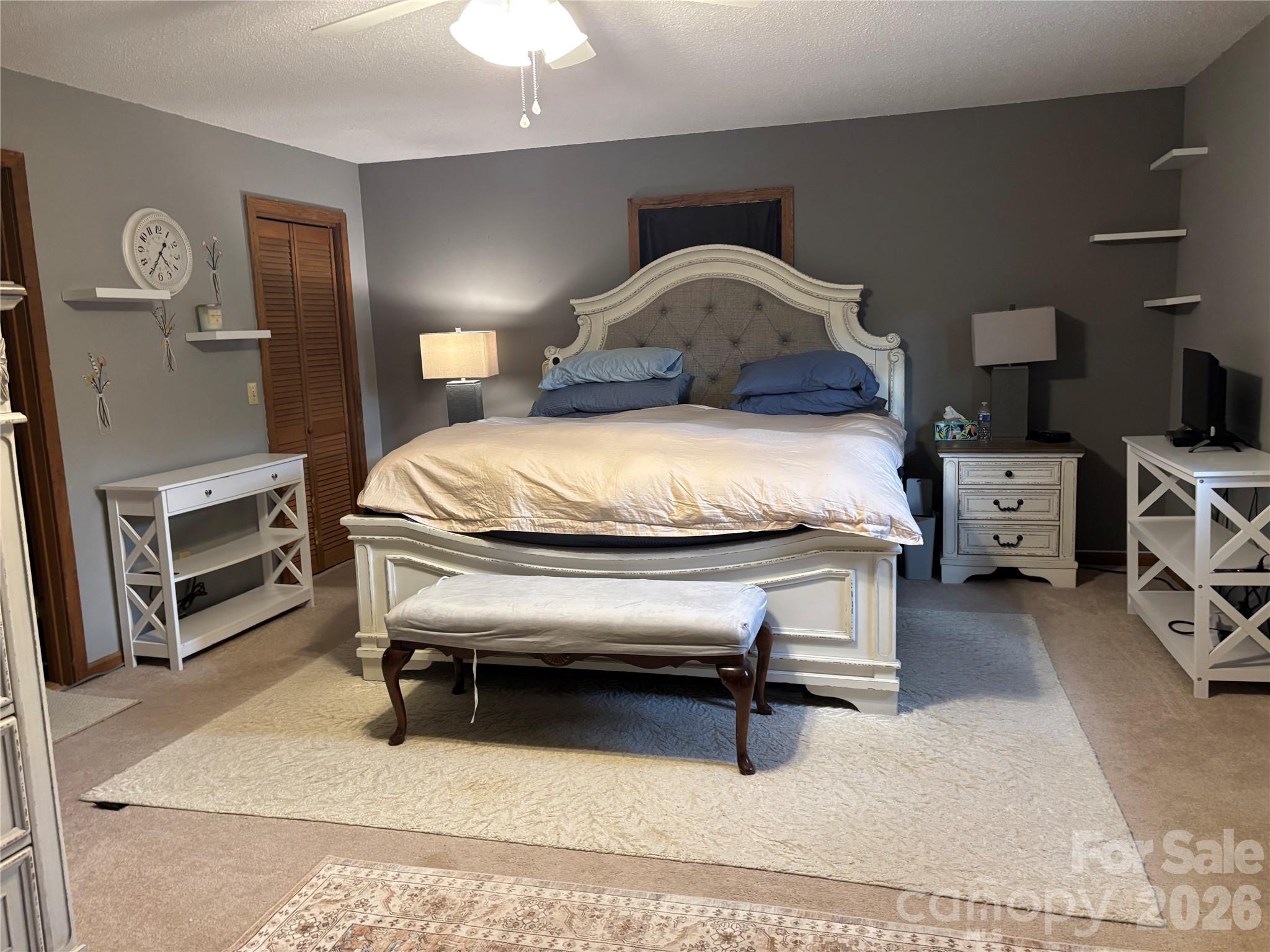 190 Benfield Road Crossnore, NC 28657 - Photo 19 of 36 a bedroom with furniture and a bed