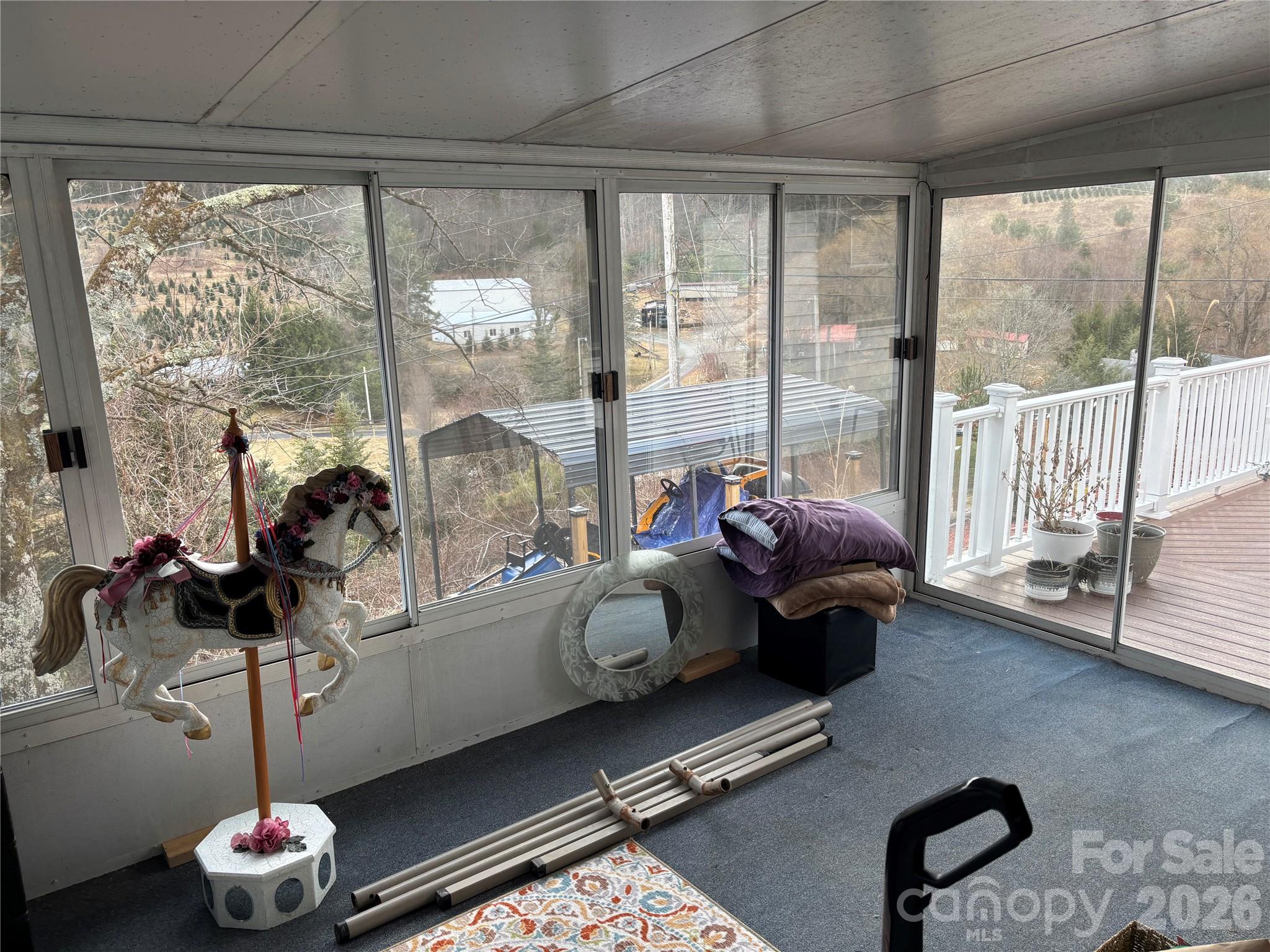 190 Benfield Road Crossnore, NC 28657 - Photo 25 of 36 a living room with furniture and a large window