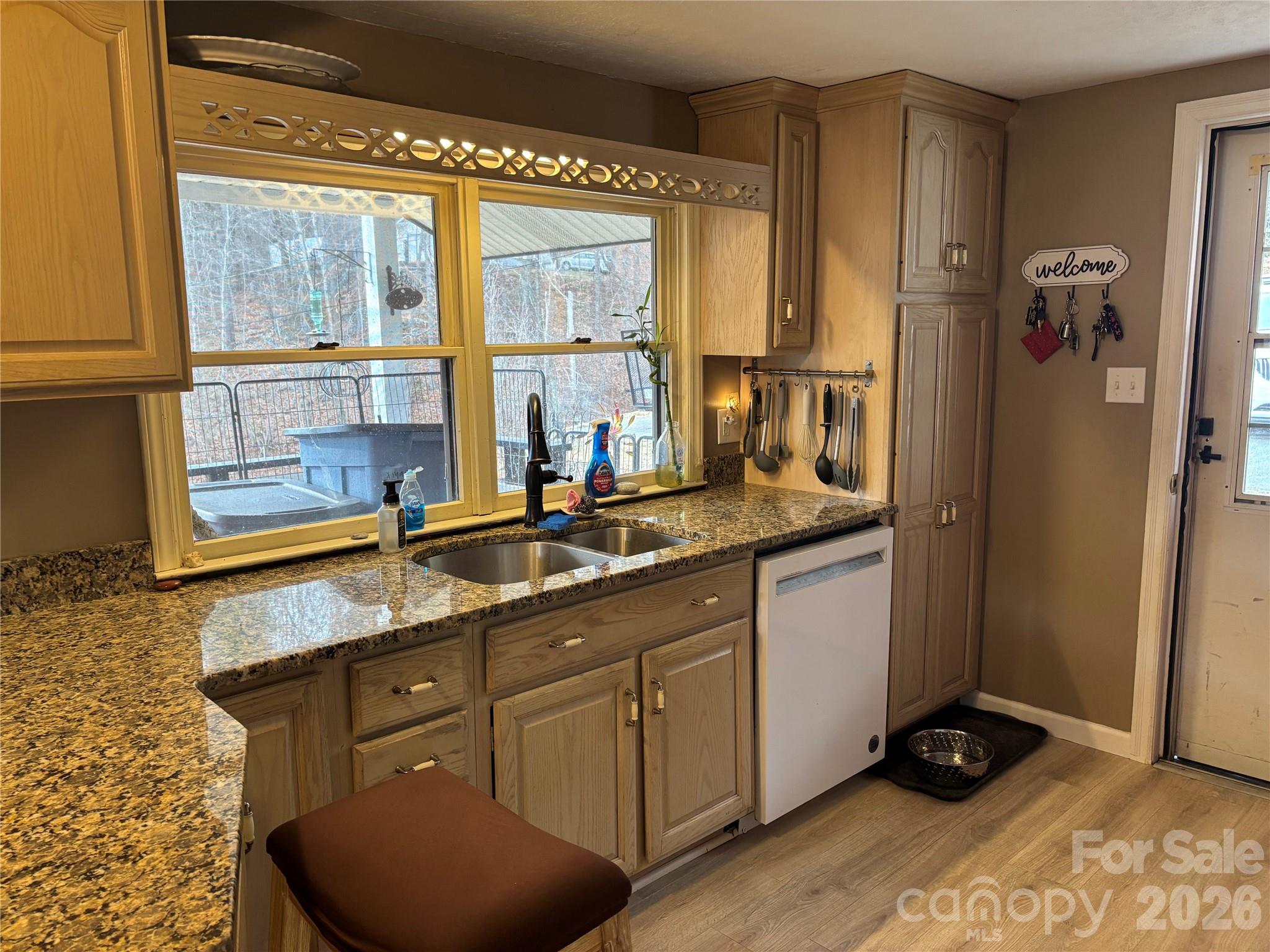190 Benfield Road Crossnore, NC 28657 - Photo 8 of 36 a room with granite countertop a sink and a window